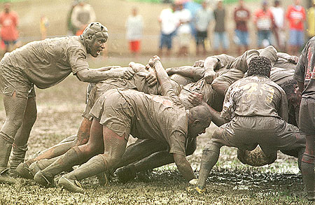 rugby-scrum-in-the-mud